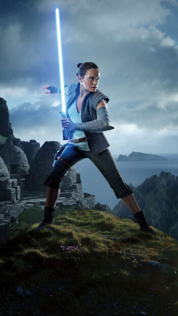 A Jedi warrior holding a glowing lightsaber standing ready on a rocky cliff with a dramatic cloudy sky