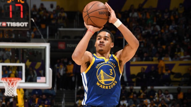 Jordan Poole preparing to shoot a basketball during a Golden State Warriors game