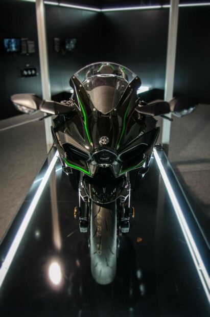 Front view of a Kawasaki motorcycle with green accents on a black body