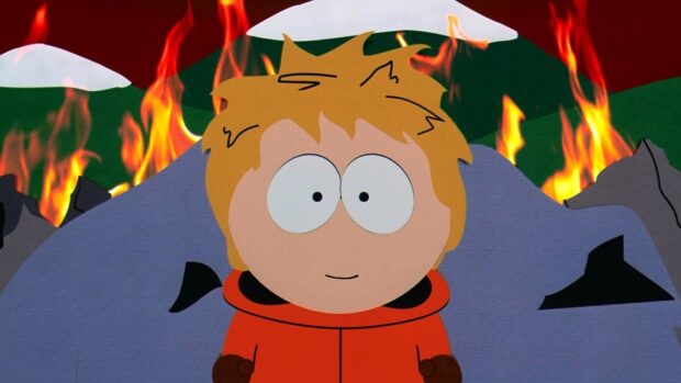 Kenny South Park character standing calmly with mountains and fire in the background