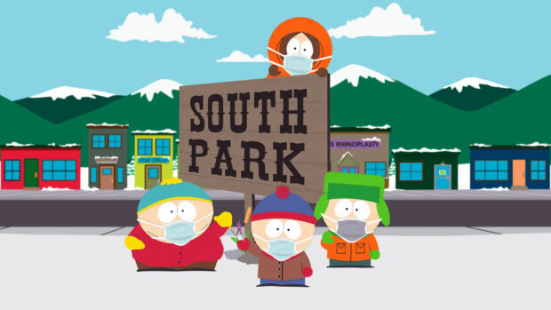 Kenny wearing a mask holding a sign with South Park characters in winter