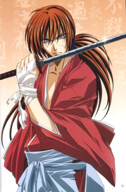 Kenshin holding a sword in a red robe ready for battle in an intense pose