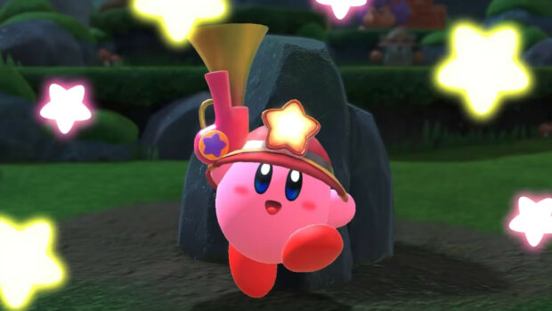 Kirby character wearing a hat with stars in a vibrant forgotten land environment