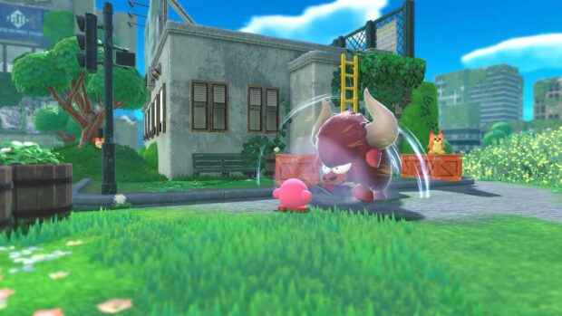 Kirby and the Forgotten Land character facing a charging bull in a vibrant city scene