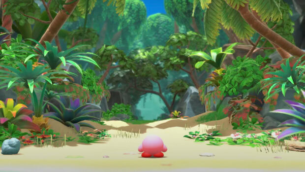 Kirby standing in a lush forest with vibrant plants in the forgotten land environment