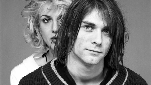 Kurt Cobain close up portrait with a woman behind him in black and white style