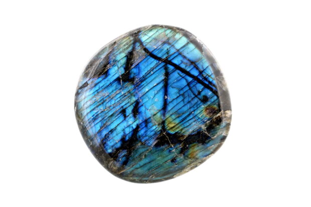 Polished labradorite showcasing vibrant blue and green colors with natural black lines