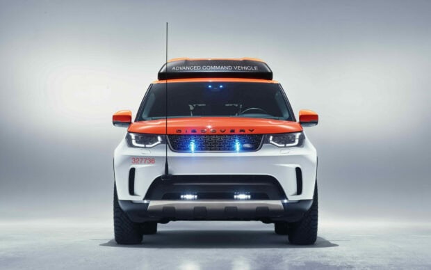 Front view of Land Rover Discovery advanced command vehicle in white and orange color