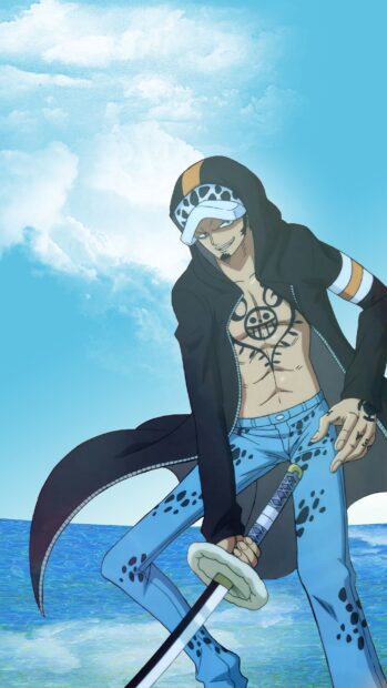 Law from One Piece stands with his sword near the ocean under a bright blue sky