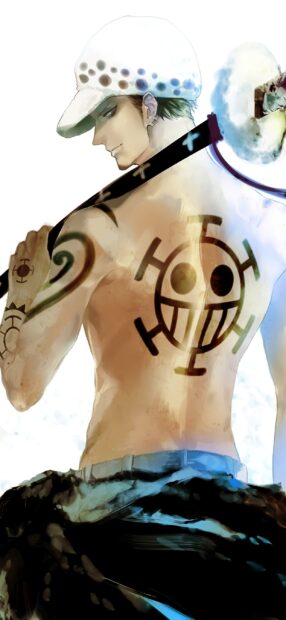 Law from One Piece showing his tattoos and wearing a white hat while holding a sword on his shoulder
