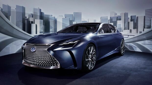 A sleek Lexus car parked indoors with modern cityscape elements in the background