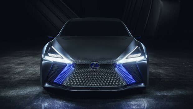 Front view of futuristic Lexus design with illuminated grille and sleek headlights