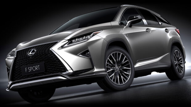A sleek Lexus F Sport car in silver color with detailed front grille and wheel design