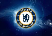 Chelsea logo in blue and gold colors with a glowing cosmic background