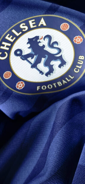 Close up of Chelsea football club logo on blue fabric background