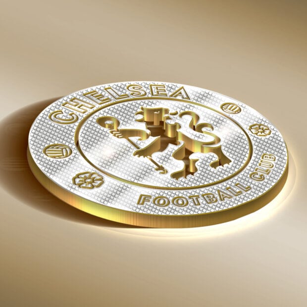 A golden Chelsea logo close up with a metallic texture and detailed craftsmanship