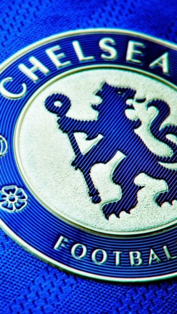 Close up view of Chelsea football club logo on blue fabric texture