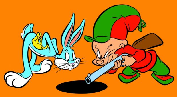Elmer Fudd aiming with a rifle while Bugs Bunny appears curious in a Looney Tunes scene
