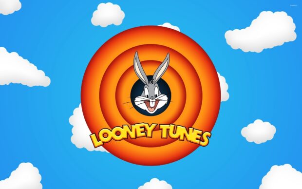 Bugs Bunny is featured in the classic Looney Tunes animated series logo with a blue sky and white clouds background