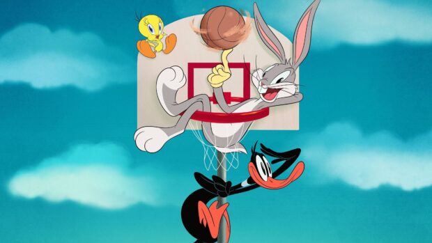 Bugs Bunny and Daffy Duck playing basketball with Tweety bird in the background