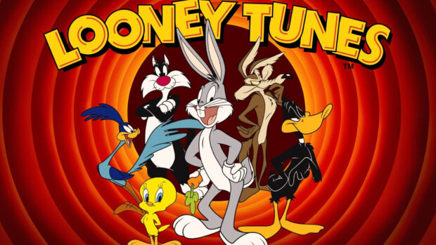 Bugs Bunny and other classic Looney Tunes characters standing together in front of a red circular background
