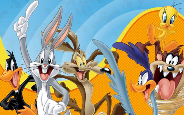 Bugs Bunny and the Looney Tunes characters celebrating together in vibrant colors