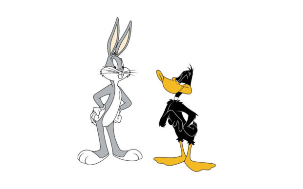 Bugs Bunny and Daffy Duck characters from Looney Tunes standing together in a white background