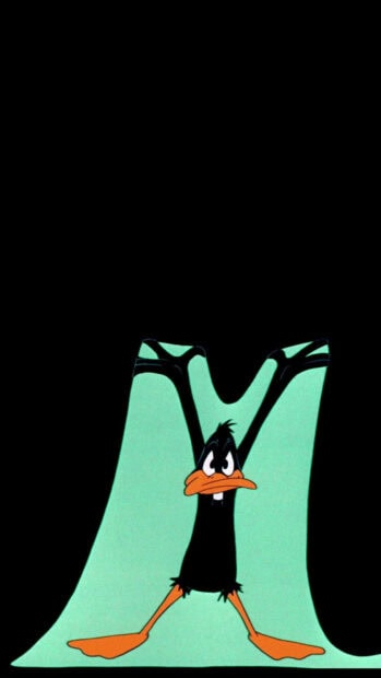 Daffy Duck stretching with a determined expression in Looney Tunes