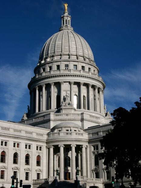 The historic capitol building in Madison Wisconsin with a clear blue sky