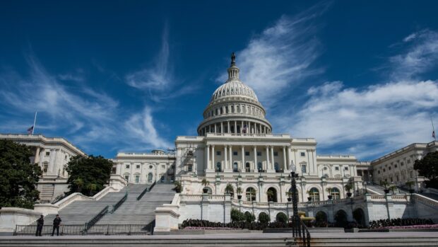 The United States Capitol building under a clear blue sky in Madison Wisconsin