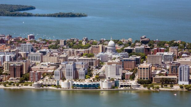 Aerial view of Madison showing the cityscape and lake with Madison in the center