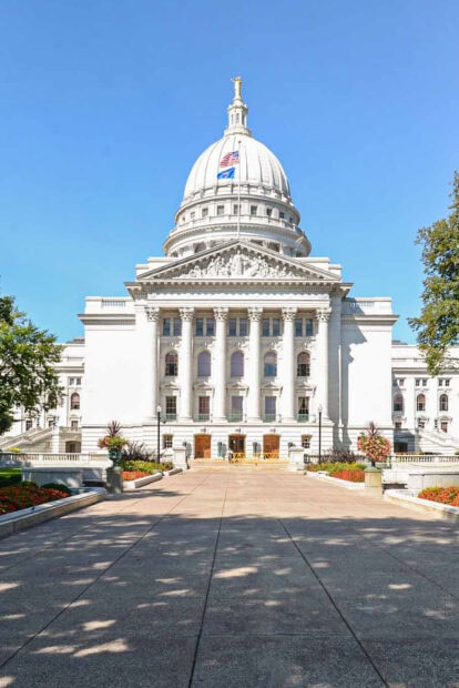 The Wisconsin State Capitol building in Madison Wisconsin under clear blue sky