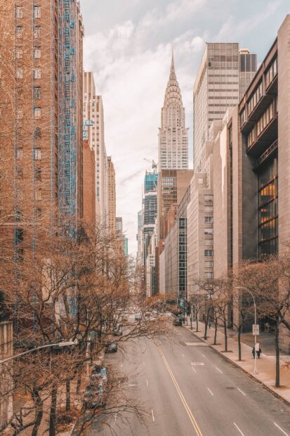 Manhattan street with skyscrapers and autumn trees in Manhattan