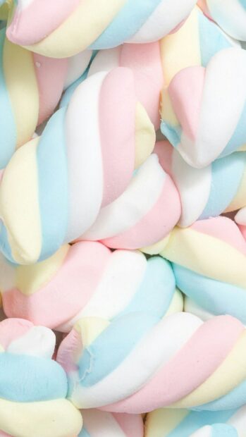 Soft colorful marshmallow twists with pastel tones in a close up view