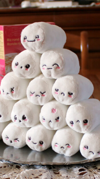 Cute marshmallow faces stacked together showing various emotions