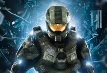 Master Chief in armored suit standing in futuristic environment with shattered glass and blue light