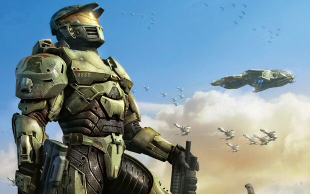 Master Chief soldier standing in armored suit with flying ships in the sky