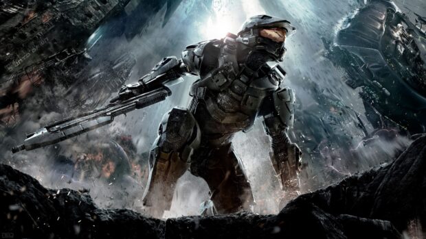 Master Chief in armor holding a weapon in a sci fi battlefield environment