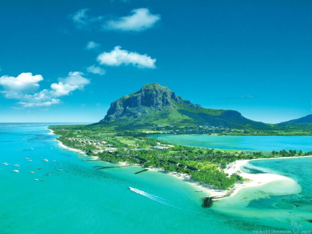 Lush Mauritius Island landscape with turquoise waters and mountain view