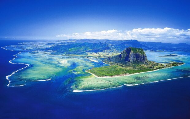 Aerial view of Mauritius Island with lush greenery and surrounding turquoise waters