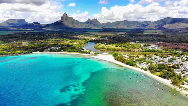 Aerial view of Mauritius Island with turquoise ocean and lush green landscape
