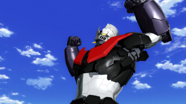 Mazinger Z robot standing triumphantly against a blue sky