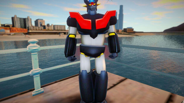 Mazinger Z robot standing on a waterfront pier with city buildings in the background