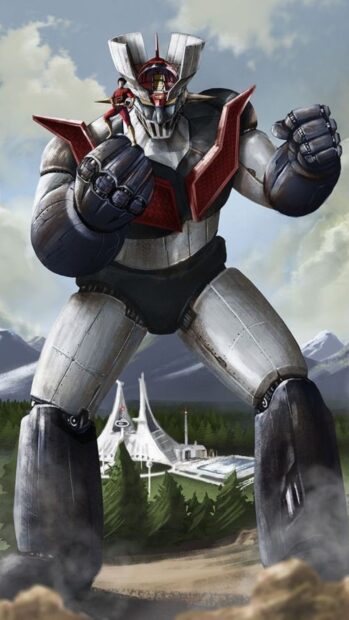 Mazinger Z robot with pilot standing on fist in a mountainous forest scene