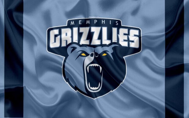 Memphis Grizzlies logo on a wrinkled blue fabric background