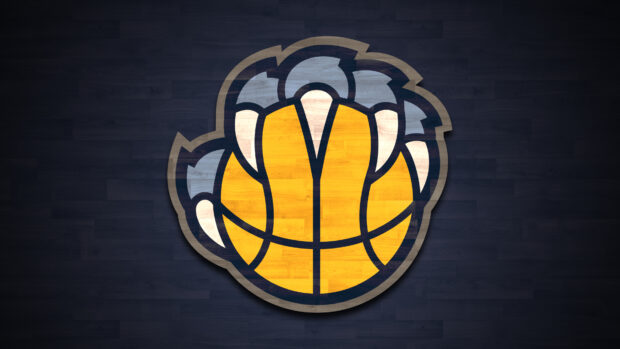A wooden basketball clutched by grizzly bear claws representing memphis grizzlies