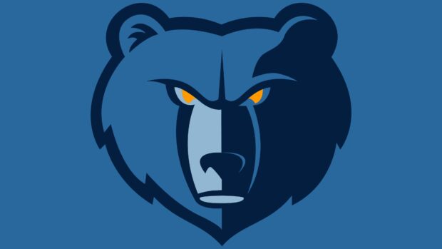 A close up of the Memphis Grizzlies logo showing a fierce grizzly bear face in blue tones
