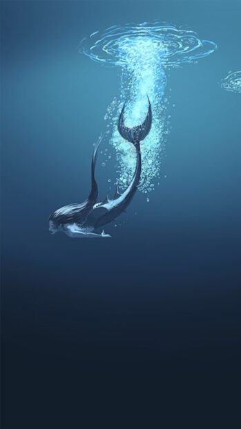 A graceful mermaid swimming downward with bubbles surrounding her tail in deep blue water