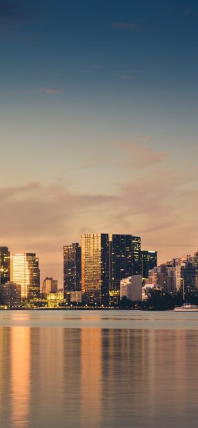 Beautiful Miami Beach skyline during sunset with stunning reflections on the water