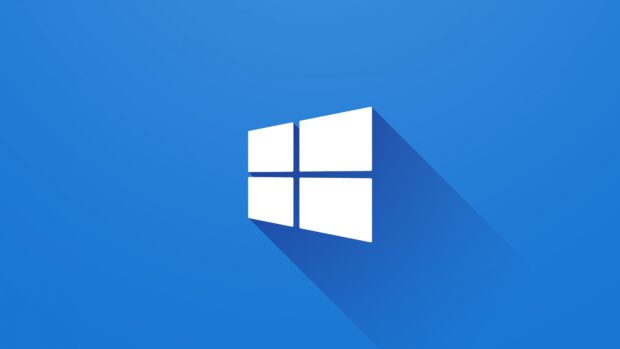 Microsoft logo with long shadow on blue background for desktop display